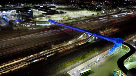 Worlds-Largest-Pedestrian-Bridge-Over-Ontarios-Highway-401-Night-Aerial-Timelapse
