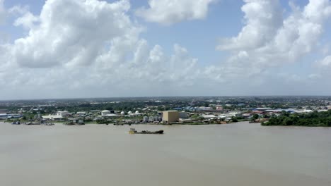 Wide-orbiting-aerial-viewpoint-of-a-oil-tanker-boat-captured-with-drone-mavic-2-pro