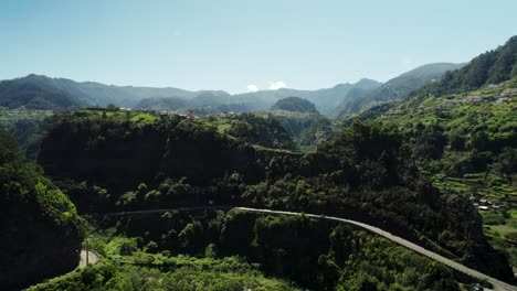 4k-Aerial-of-Madeira-Landsacep,-Roads-and-Green-Fields