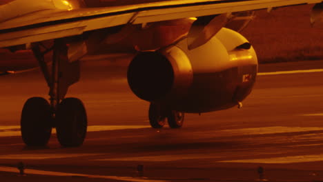 established-close-up-of-engine-turbine-airplane-jet-parked-on-runway-airstrip-in-airport
