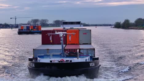 Veja-Container-Ship-Navigating-Across-The-River-Of-Schelda-In-Zwijndrecht,-Belgium