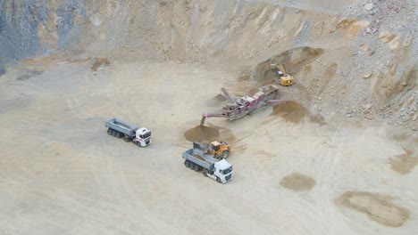 Heavy-machines-extracting-and-crushing-stones