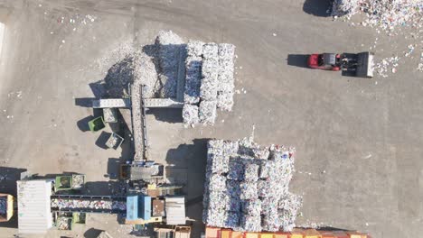 Aerial-top-down-of-plastic-trash-processing-factory-with-divide-lines-of-waste