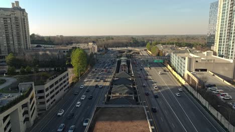 Traffic-And-Pedestrian-Footbridge-Over-The-Highway-In-Atlanta,-Buckhead-District,-Georgia-USA