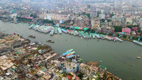 Aerial-over-Sadarghat-Boat-Terminal-in-Dhaka,-Buriganga-River,-Bangladesh