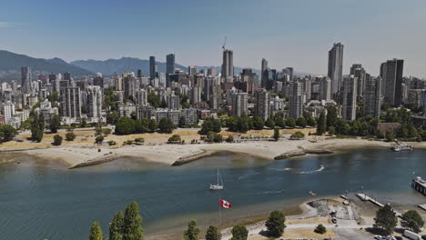 Vancouver-BC-Canada-Aerial-v107-panoramic-view-drone-flyover-False-Creek-capturing-sandy-beach,-West-End,-downtown-cityscape-and-Granville-island-views---Shot-with-Mavic-3-Pro-Cine---July-2023
