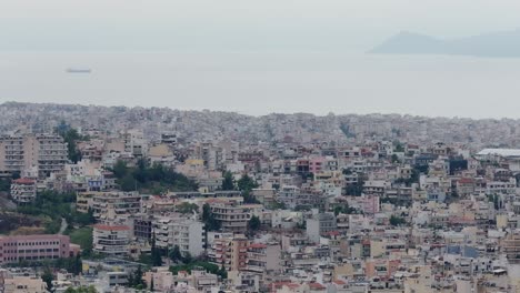 drone-aerial-footage-of-Athens-,-buildings-and-sea-view