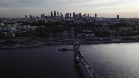 Aerial-View-of-Agrafka-Bridge-and-Warsaw-Cityscape-at-Dusk