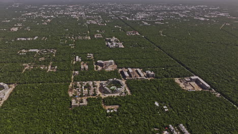 Tulum-Mexico-Aerial-v23-birds-eye-view-drone-flyover-outer-town-capturing-new-construction-projects-of-luxury-resorts-surrounded-by-lush-Mayan-jungle---Shot-with-Mavic-3-Pro-Cine---July-2023