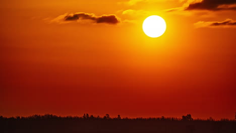 Timelapse-of-sun-solely-rising-up,-beautiful-golden-dawn-in-Latvia-countryside