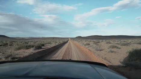 POV-Driving-In-The-Desert-In-Salt-Lake-City,-Utah,-USA