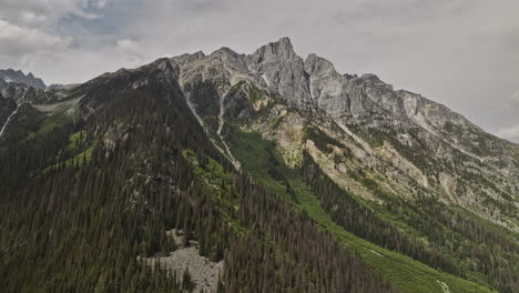 Rogers-Pass-BC-Canada-Aerial-v5-drone-captures-stunning-scenery-of-Glacier-National-Park,-showcasing-the-majestic-peaks,-mountain-ranges-and-Hermit-Trailhead---Shot-with-Mavic-3-Pro-Cine---July-2023