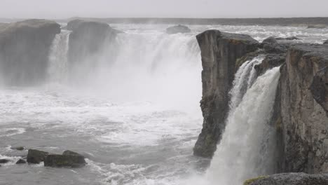 Static-slow-motion-view-of-waterfalls-of-Godafoss,-Iceland,-along-ring-route-1