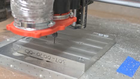 CNC-machine-router-drilling-a-hole-in-aluminum