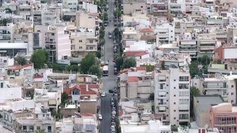 aerial-Athens-city-centre-,urban-footage-of-concrete-buildings-and-horizontal-road
