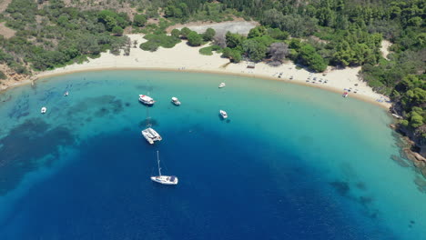 Aerial:-Panoramic-drone-shot-of-Tsougria-island-beach-near-Skiathos,-Sporades,-Greece