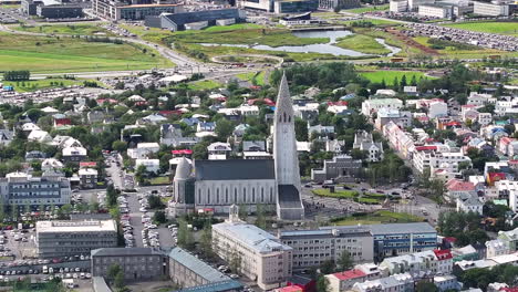 Reykjavik,-Iceland,-Aerial-View-of-Hallgrimskirkja-Church-and-Downtown-Buildings-on-Sunny-Day