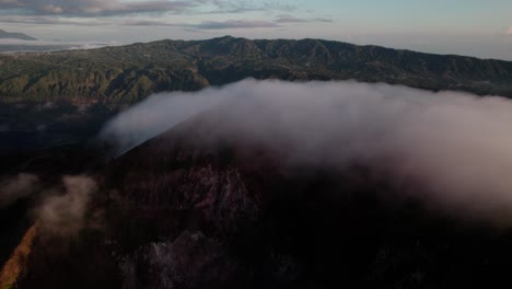 Foggy-Landscape-Of-Mount-Batur-In-Bali,-Indonesia---Aerial-Drone-Shot