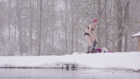 2-ice-bathing-women-finish-preparing-and-approach-the-lake-in-underwear
