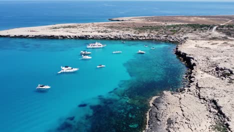 Yachts-and-Recreational-Boats-Anchored-on-Cape-Greco,-Ayia-Napa,-Cyprus