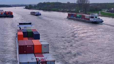 Cargo-Shipping-Lines-On-The-Waters-Of-Schelda-River-In-Zwijndrecht,-Belgium