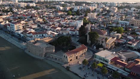 Larnaca-Oldtown-Medieval-Fort-in-Cyprus,-Aerial-Orbit