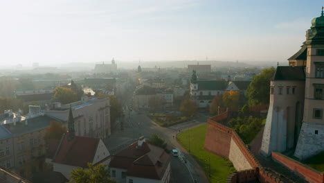 Foggy,-autumn-morning-over-Old-Town,-Kazimierz-and-Stradom-district-in-Krakow