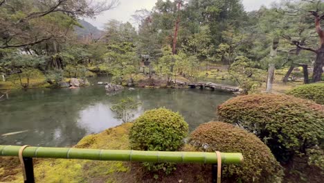 Temple-Garden-Pond-With-Falling-Raindrops-In-Konchi-in-Temple,-Kyoto,-Japan