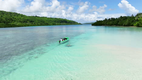 Tourists-On-Boat-Trip-On-Clear-Blue-Lagoon-On-Moso-Island-In-Vanuatu