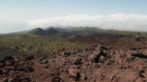 Timelapse-with-fast-moving-clouds,-volcanic-rocky-landscape-and-pine-forest,-Teide-Nation-park-on-Tenerife,-Canary-Islands