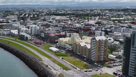 Reykjavik,-Iceland,-Aerial-View-of-Coastal-Traffic-and-Modern-Residential-Buildings,-Drone-Shot