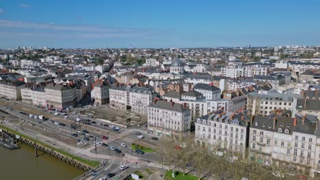 Pont-Anne-de-Bretagne-bridge-with-Notre-Dame-de-Bon-Port-church-in-background,-Nantes-cityscape,-France