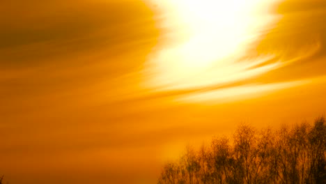 Bright-sunlight-during-sunset-golden-hour-with-deep-yellow-cloud-formation