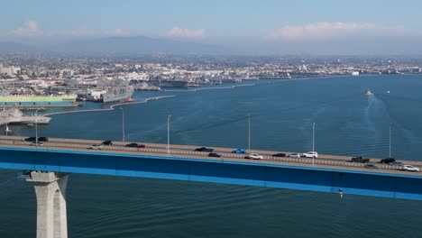 Aerial-View-of-Vehicles-Driving-On-Coronado-Bridge-Over-San-Diego-Bay-In-California,-USA