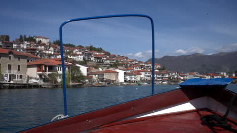 Tourism-boat-on-a-sunny-day,-Lake-Ohrid,-North-Macedonia,-Albania