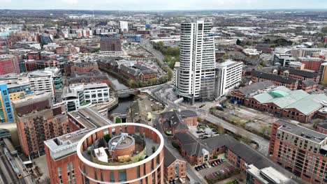 Leeds-City-UK-Pull-back-drone-aerial-reverse-reveal-over-round-apartment-block