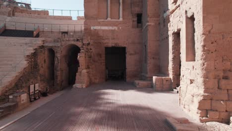 Looking-back-on-a-stage-floor-of-an-open-air-theater,-that-of-Orange,-with-its-stands