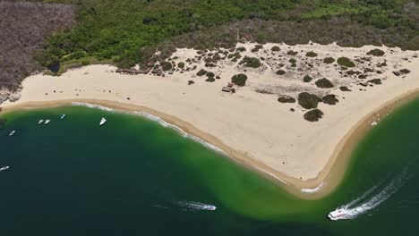 High-altitude-perspectives,-drone-views-of-Cacaluta-Bay,-Huatulco,-Oaxaca