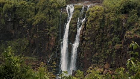 Waterfalls-Flowing-Through-Mossy-Cliffs.---wide-shot