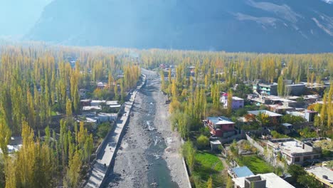 Aerial-shot-of-Skardu-city-during-daytime-with-landscape-of-mountains-at-background-in-Pakistan