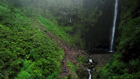 Aerial-of-Large-Waterfall-in-the-middle-of-the-Jungle