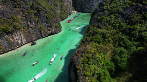 Tourist-boats-entering-in-emerald-waters-of-Pileh-lagoon