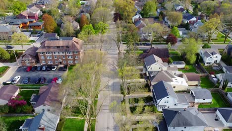 panning-shot-that-begins-in-a-suburban-neighborhood-and-looks-up-towards-a-city-skyline