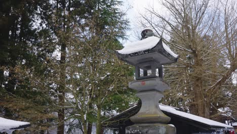 Snow-on-Japanese-Stone-Lantern-at-Shrine,-Yamadera-Temple