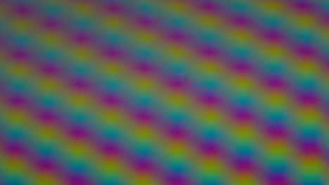 Nahaufnahme-Von-Rechteckigen-RGB-Pixeln,-Die-Sich-In-Einem-Stroboskopischen-Muster-Bewegen-Und-Dabei-Langsam-In-Den-Fokus-Und-Aus-Dem-Fokus-Geraten