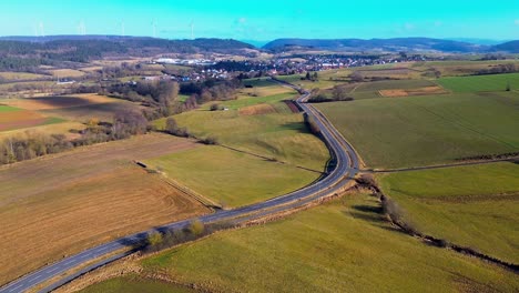 Countryside-Vistas:-Roads-Intertwine-Amongst-Patchwork-Farmlands