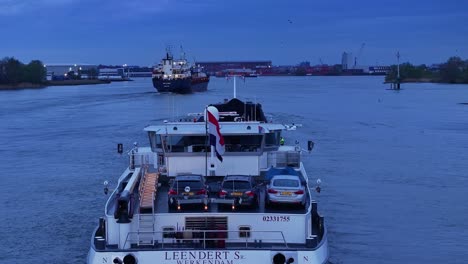 Inland-Vessel-Loaded-With-Cars,-Cruising-On-River-At-Dusk-In-Zwijndrecht,-Netherlands