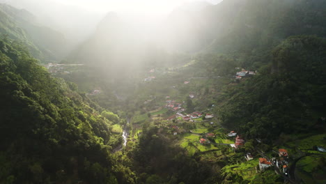 Panoramic-drone-movement,-Madeira-mountain-valley,-sunshine-on-Madeira-nature