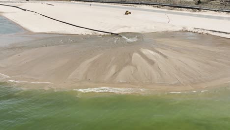 Muskegon's-famous-beach-undergoing-Spring-Dredging-Repair