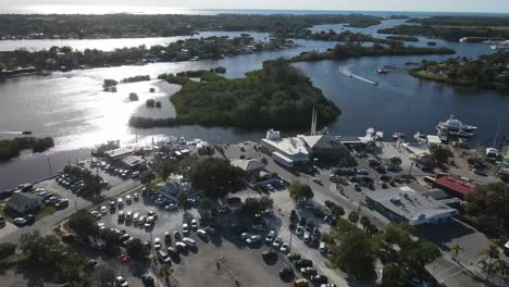 Aerial-view-of-glistening-sun-over-port-city